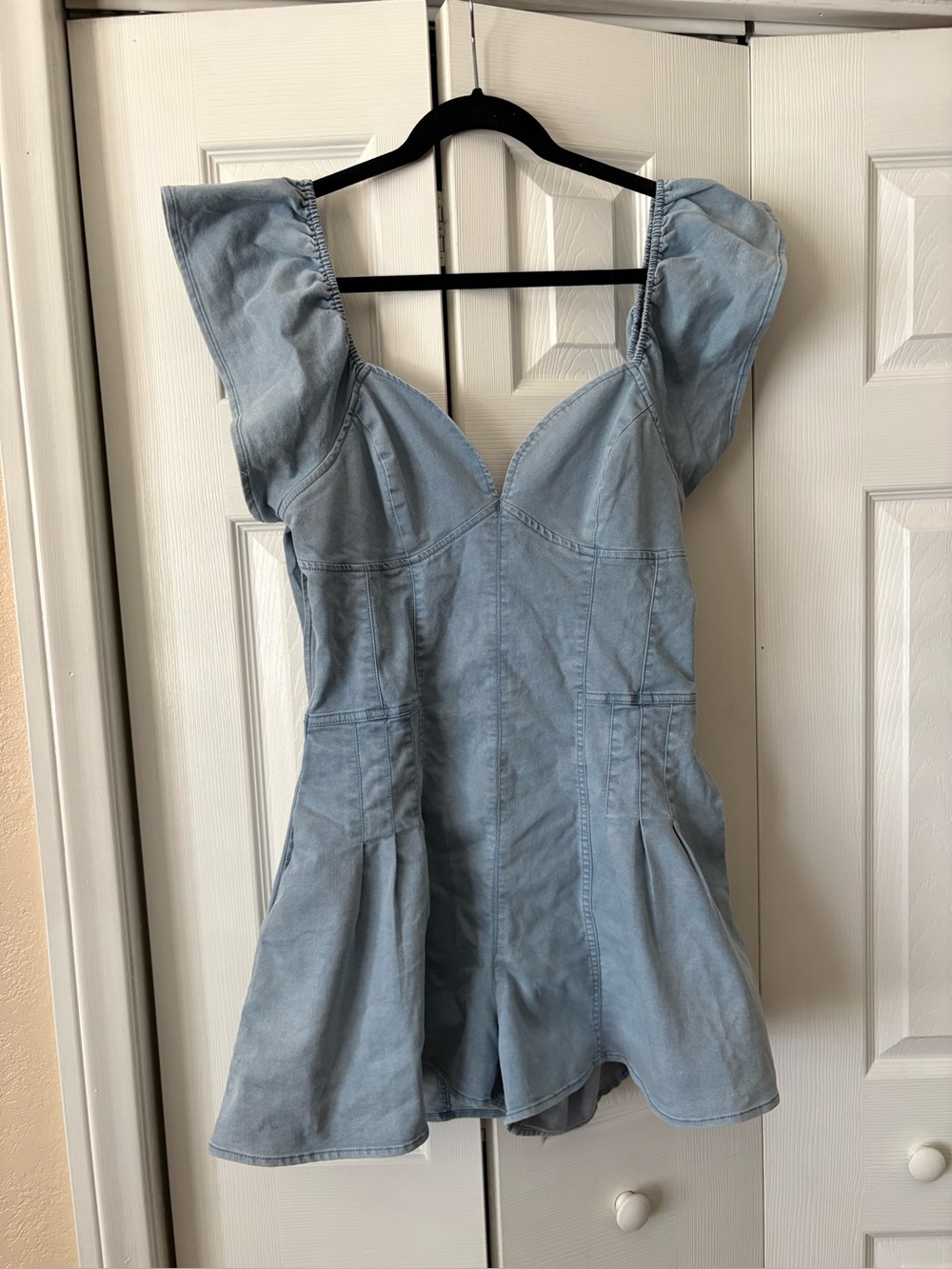 Modenaire STRUCTURED ZIP FRONT ROMPER WITH FLUTTER SLEEVES AND PLEATED $135 S